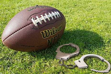 football-and-handcuffs.jpg